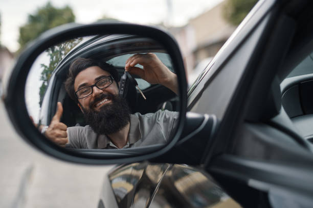 istock Charismatic man holding car keys 1018811742