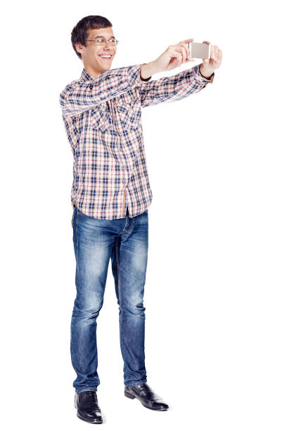 istock Man taking picture with phone full body 1018811766