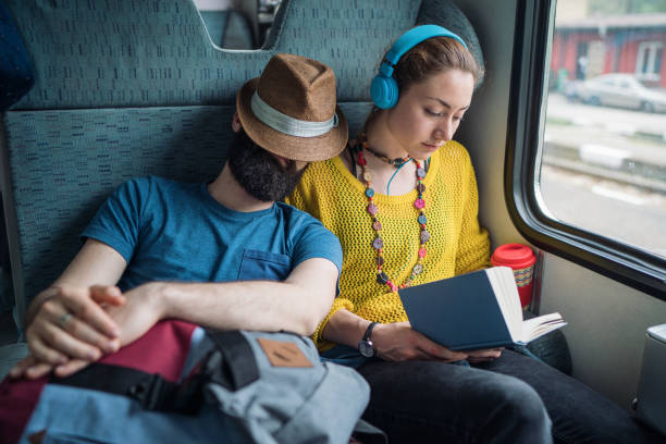 istock Young couple travelling by train 1018824626