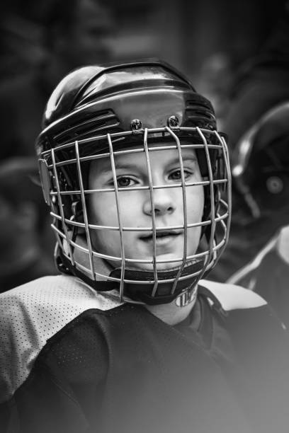 istock Young boy hockey player 1018834900