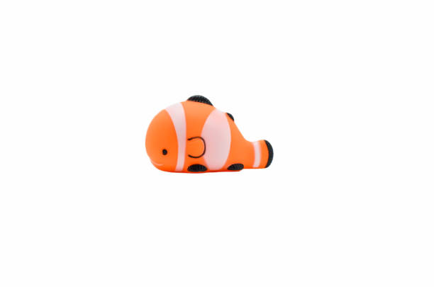 A cute rubber fish toy isolated on white background