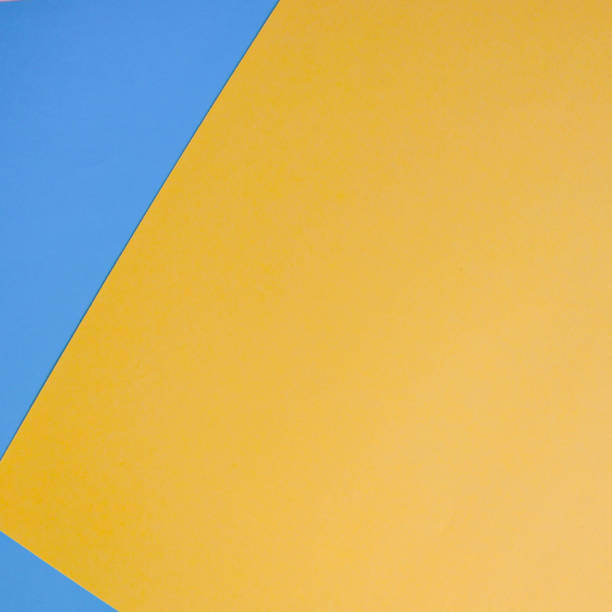 istock Bright paper background for design. Blue and yellow. 1018839980
