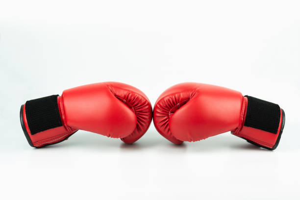 istock Red leather boxing gloves isolated on white background 1018851024