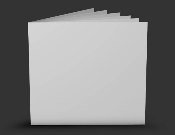 istock Square leaflet, brochure with few pages standing on floor blank cover. 1018858072