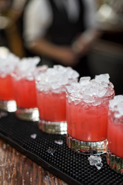 istock Row of glasses with a cocktail 1018873740