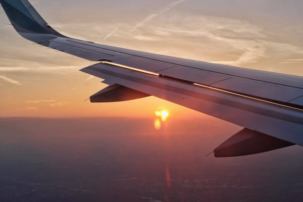 istock view on the wing of an aircraft during sunset 1018874446