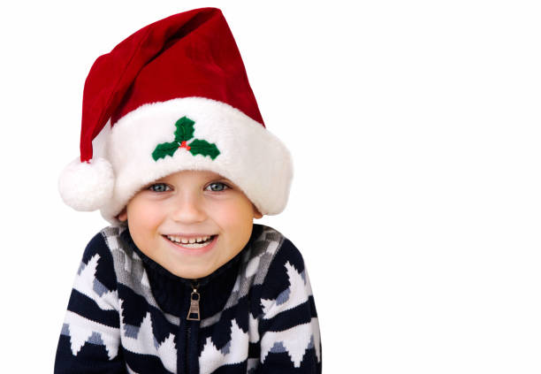 istock Child in a red Christmas hat isolated on a white background 1018896896
