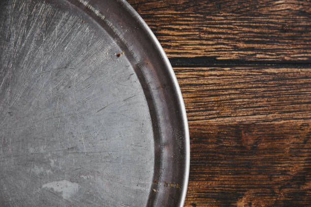istock top view of empty metal kitchen tray on rustic wooden table 1018900458