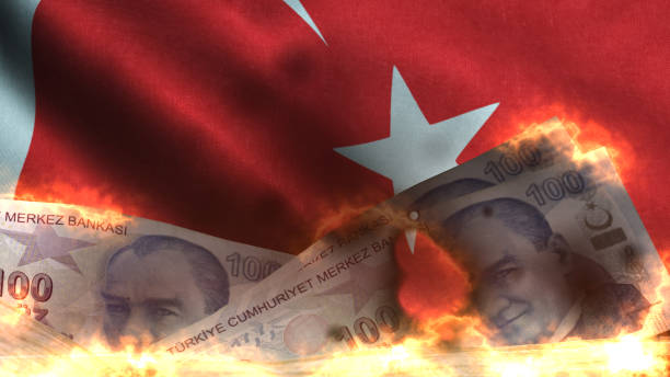 istock Burning Turkish Lira with Turkish Flag Background 1018907570