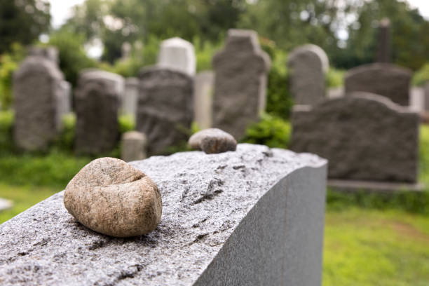 istock Mourning rocks on a gravestone in Jewish cemetery 1018911578
