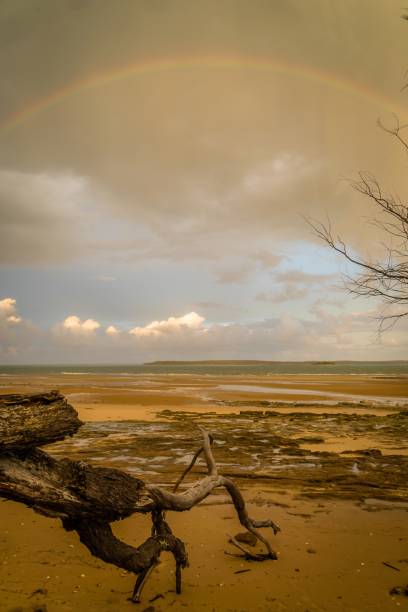 istock Rainbow over the sea in Fraser Island in Australia 1018913928