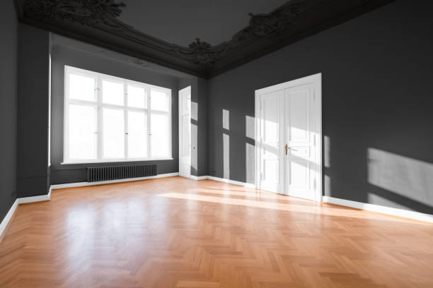 istock Empty room with parquet floor after renovation 1018922046