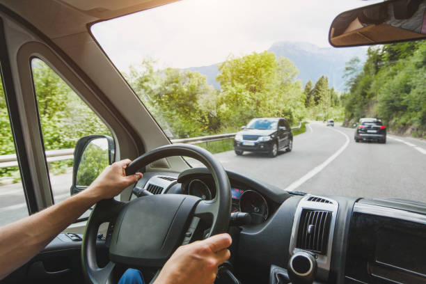 istock hands of truck driver on steering wheel 1018926558