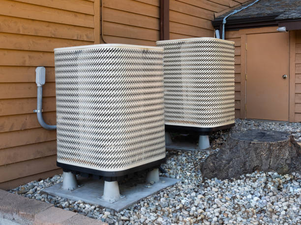 istock Air conditioning units outside an apartment complex 1018929592