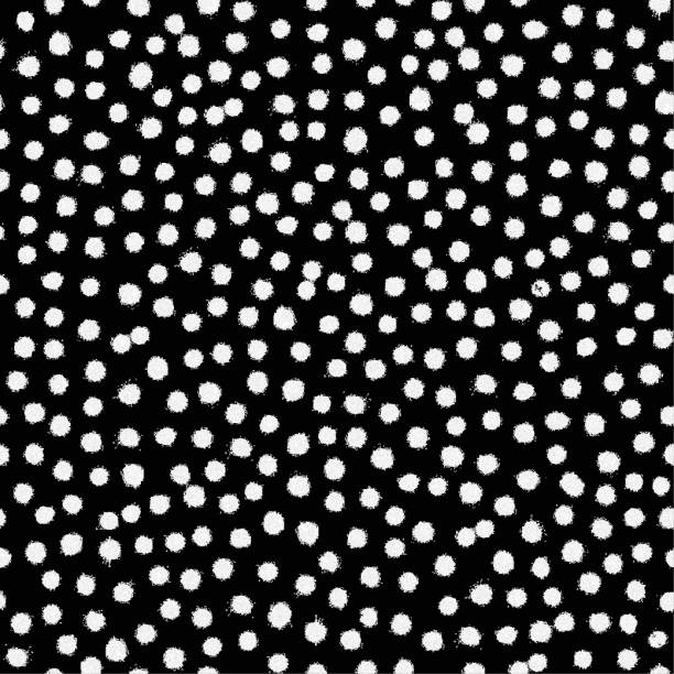 Dappled white painted polka dots on black background - creative classic seamless fabric texture pattern in vector White polka dots painted by thick white paint by brush on black paper background. Seamless minimalistic vector pattern - duplicate it vertically and horizontally to get unlimited area. Texture pattern marks with spots or rounded patches
Scalable to any size.
Visible uneven rough traces of paint - abstract background. black background shape white paper stock illustrations