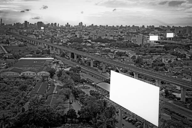 istock black and white cityscape and train transportation with many billboard 1018960024