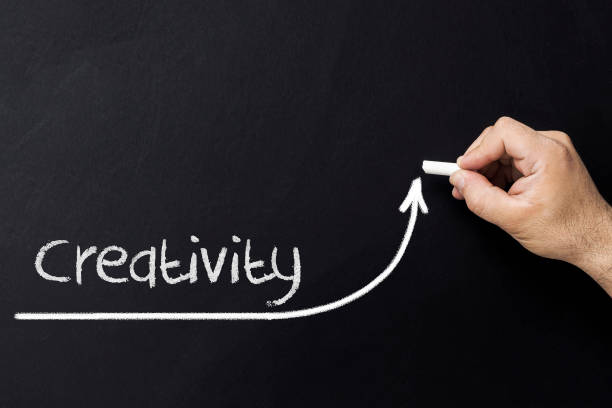 istock Growing creativity concept. Businessman draw accelerating line of improving creativity. 1018966168