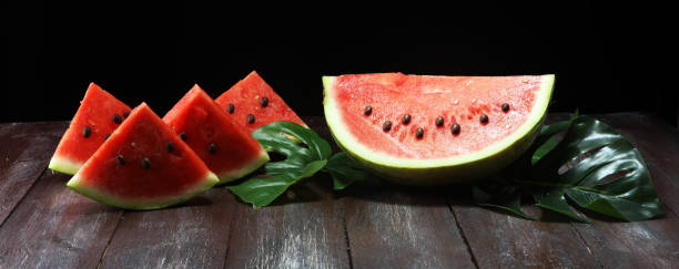 istock watermelon on table. juicy summer fruit in slices. 1018969760