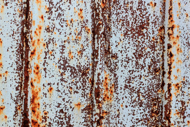istock chipped paint rusty textured metal background. texture of rusty iron close-up 1018975230