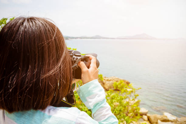 istock Young woman photography 1018976108