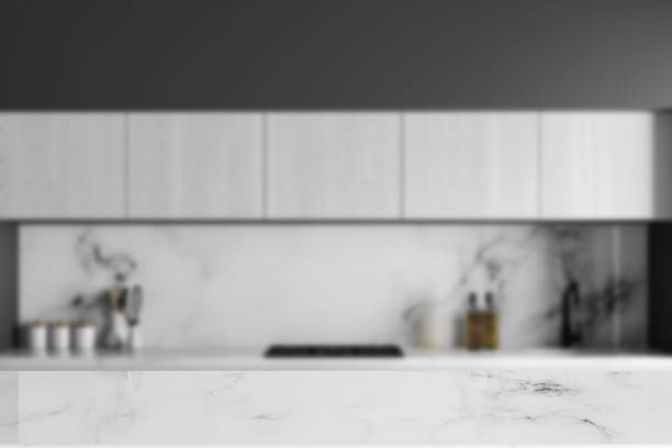 istock White and gray countertops in kitchen blur 1018990756
