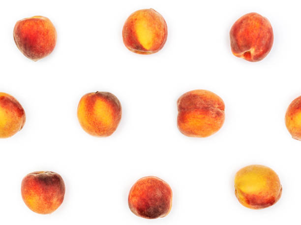 istock Background of ripe peaches on white. 1018991418