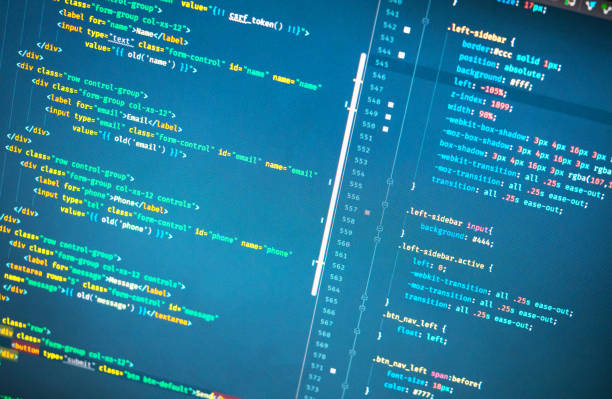 istock Lines of php code on the monitor on blue background. Close-up 1018991992
