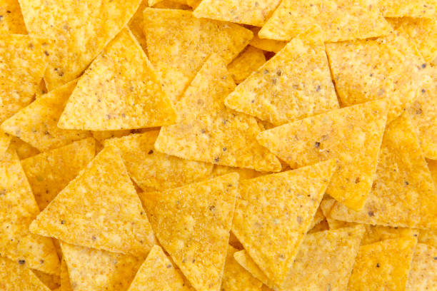 istock Tortilla chips, close-up. Mexican food. Top view, flat lay, overhead. 1018997406