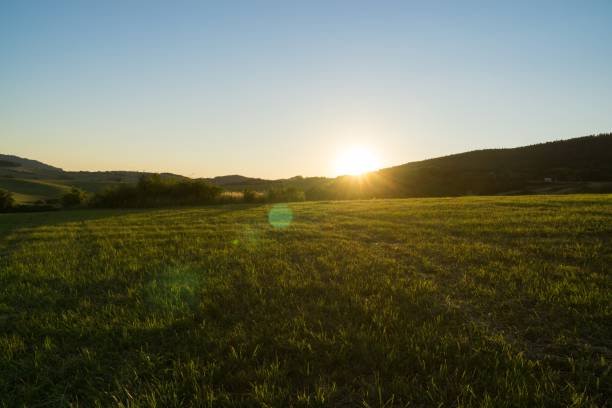 istock Sunrise and sunset over the hills and town. 1018999976