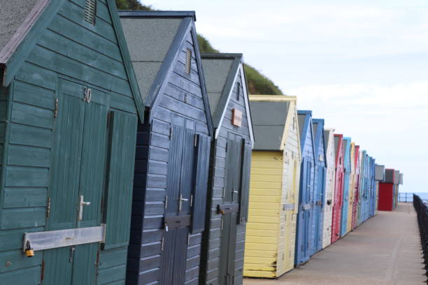 istock colourful beach huts in english east coastline 1019000628