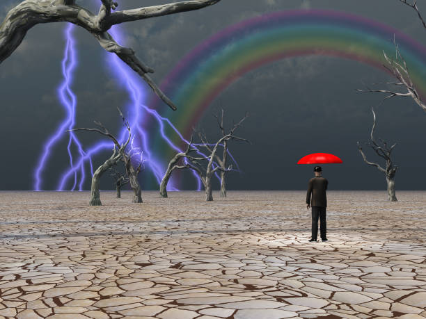 istock Man takes in storm protected under umbrella 1019009390