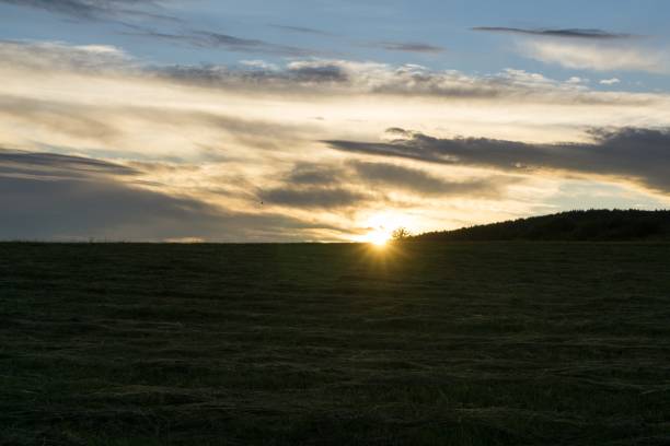 istock Sunrise and sunset over the hills and town. 1019009640
