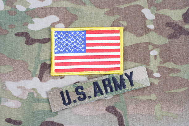 istock US ARMY branch tape with flag patch on camouflage uniform 1019028888