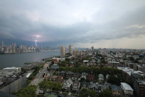 Lightning Striking New York City Lightning striking NYC during storm new york city skyline new york state night stock pictures, royalty-free photos & images
