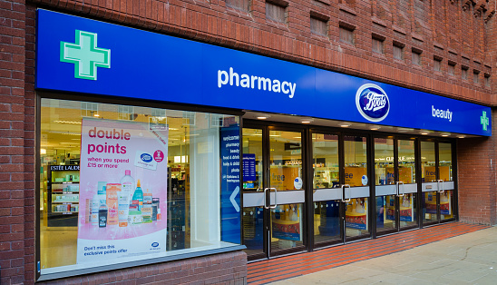 Chester, UK: Aug 6, 2018: Boots is a chain of pharmacy stores in the UK which has shops in most town and city centres such as this one in Chester. They are advertising a double points promotion.