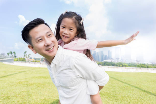 istock Little girl pretends to fly 1019065952