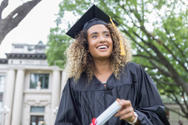 istock Optimistic female college graduate 1019066144