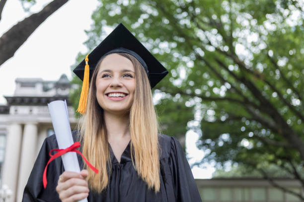 istock Confident female college graduate 1019066160