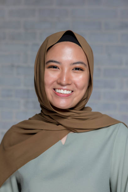 istock Beautiful Malaysian woman laughs for camera 1019066262