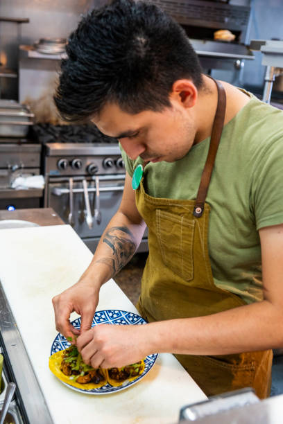 istock Mexican chef working in an authentic Mexican restaurant 1019071636