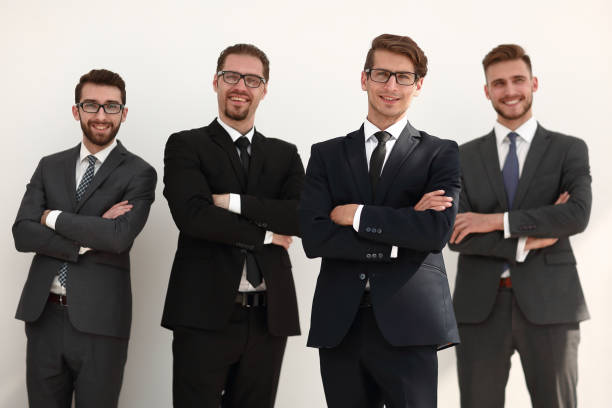 istock smiling business people standing together 1019074748