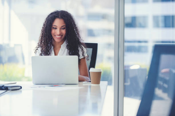 istock African American woman working on a laptop. 1019081804