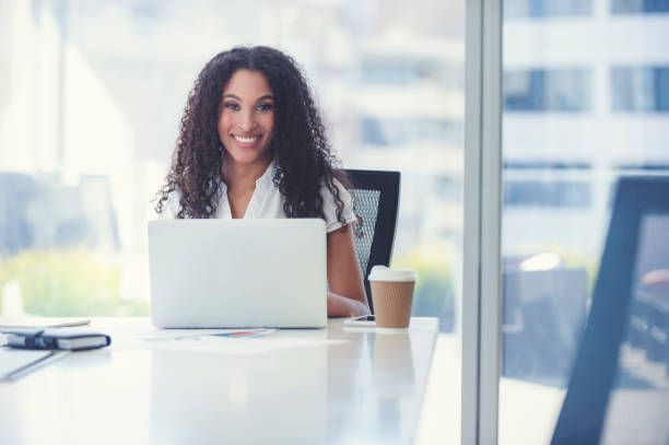 istock African American woman working on a laptop. 1019081810