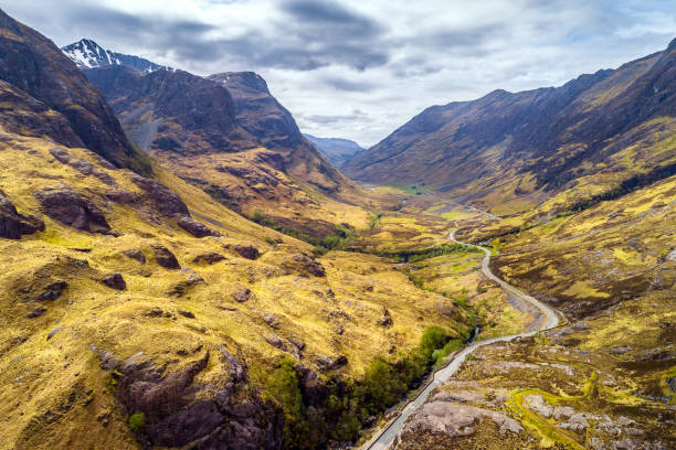 Mountain landscape of Glen Coe The Mountain landscape of Glen Coe glencoe scotland photos stock pictures, royalty-free photos & images