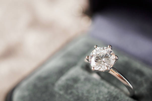 istock luxury engagement Diamond ring in jewelry gift box 1019109780
