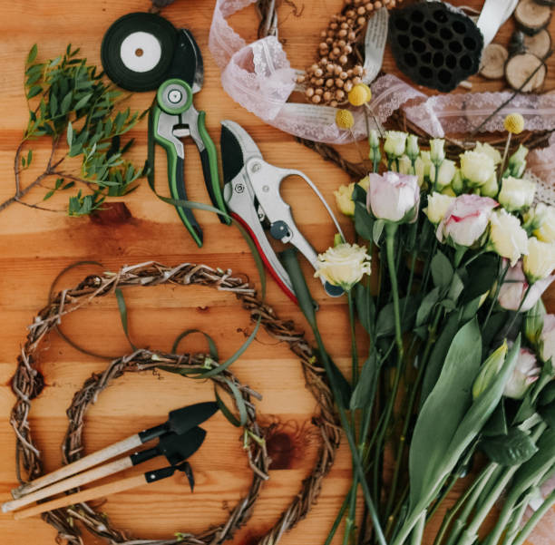 istock florist collects bouquet decorates different flowers 1019110262