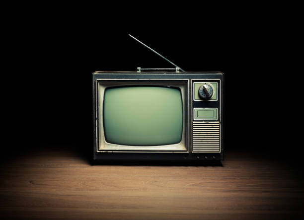 istock Vintage TV on wooden floor 1019110914