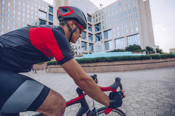 istock Man on racing bicycle in city 1019118356