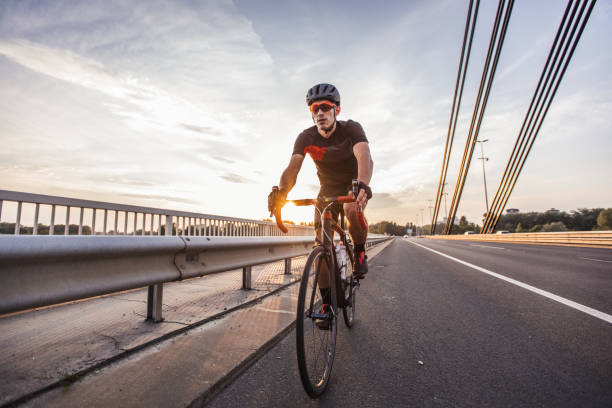 istock Sports man riding bicycle 1019118874