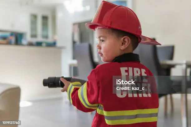 little-boy-pretending-to-be-a-fireman.we